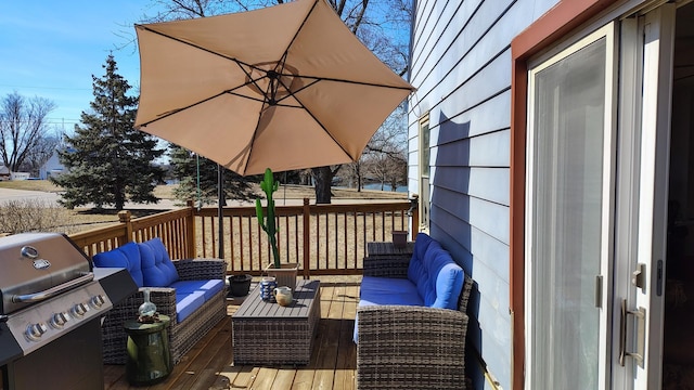 deck with outdoor lounge area and a grill