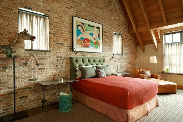 bedroom with high vaulted ceiling, beamed ceiling, brick wall, and wood ceiling