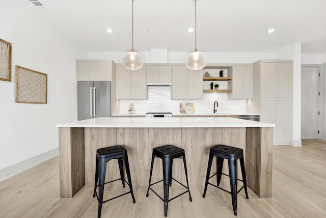 1548 W Ardmore Ave Unit 3F, Chicago, IL 60660 - kitchen with high end refrigerator, light wood-style floors, open shelves, light countertops, and tasteful backsplash
