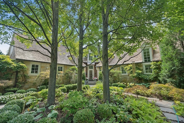 view of front facade featuring stone siding