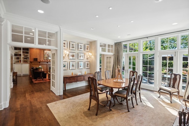 dining area featuring recessed lighting, french doors, wood finished floors, and ornamental molding