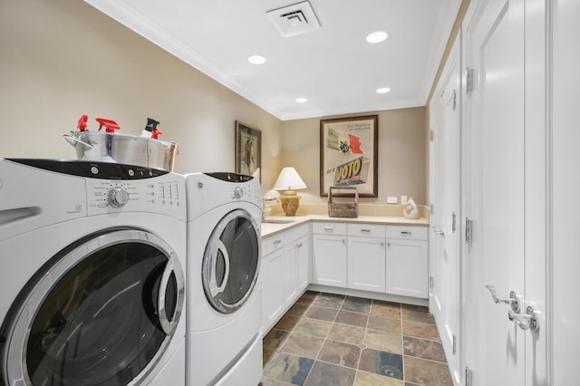 laundry area featuring visible vents, recessed lighting, cabinet space, crown molding, and washing machine and clothes dryer