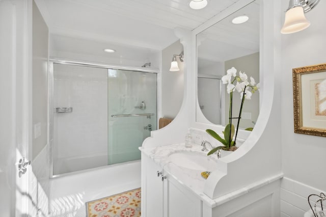 bathroom with recessed lighting and vanity