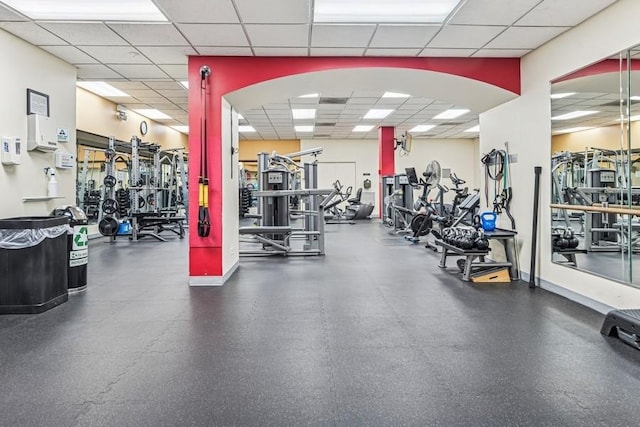 gym with a drop ceiling