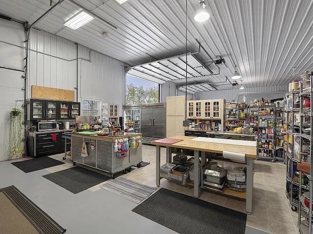 22915 Mcguire Rd, Wilmington, IL 60481 - garage with a workshop area and metal wall