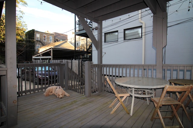 deck featuring outdoor dining area