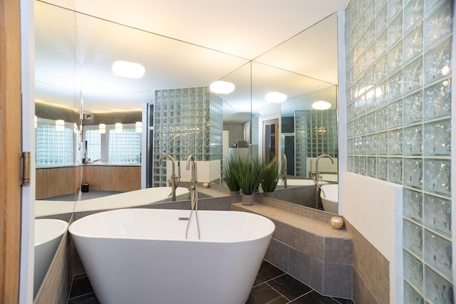 full bath featuring a freestanding tub