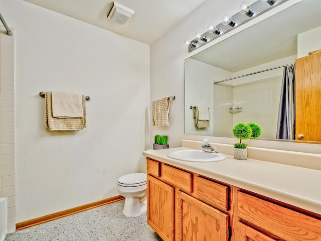 full bathroom with visible vents, baseboards, toilet, vanity, and speckled floor