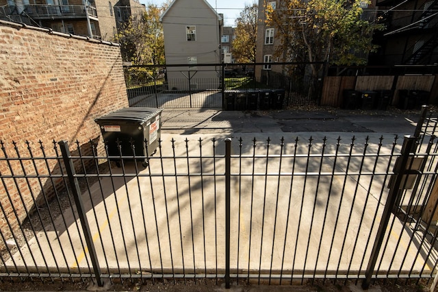 view of gate featuring fence