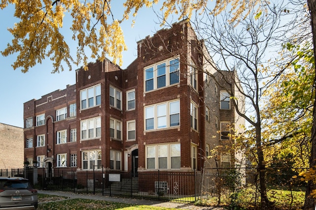 view of property featuring a fenced front yard