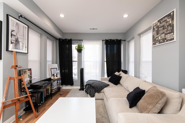 bedroom featuring recessed lighting, visible vents, and wood finished floors