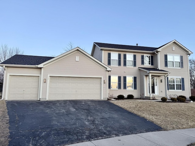 view of front of house with driveway and an attached garage