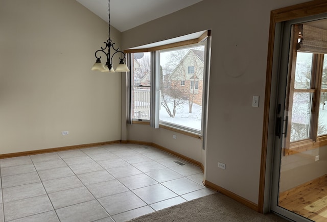 unfurnished dining area with visible vents, baseboards, vaulted ceiling, a chandelier, and light tile patterned flooring