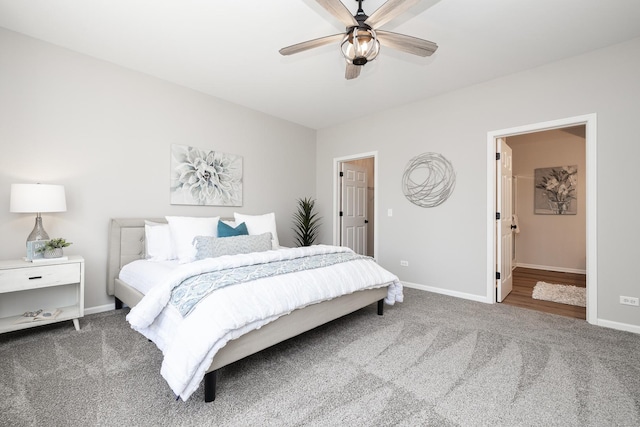 bedroom featuring ceiling fan, baseboards, and carpet