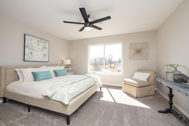 carpeted bedroom with baseboards and ceiling fan