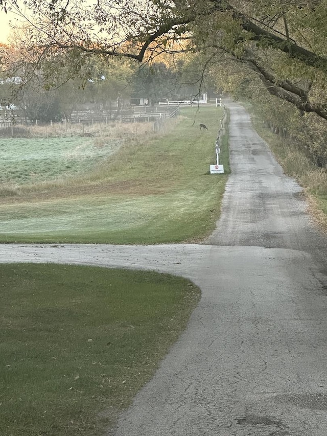 view of home's community featuring a yard