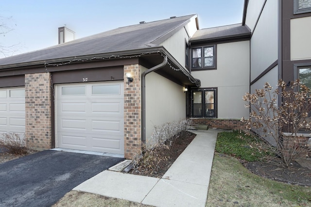 view of front of house with brick siding