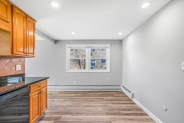 kitchen featuring tasteful backsplash, dark countertops, recessed lighting, light wood-style flooring, and dishwasher