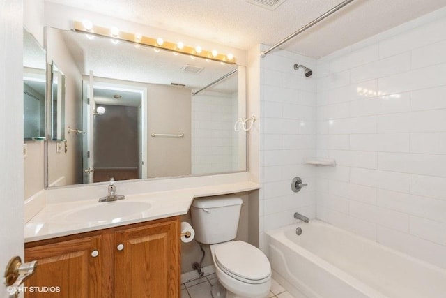 bathroom featuring shower / bath combination, a textured ceiling, toilet, and vanity