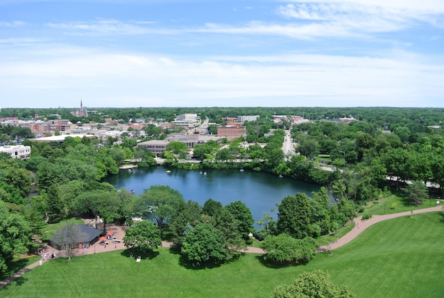 birds eye view of property with a water view