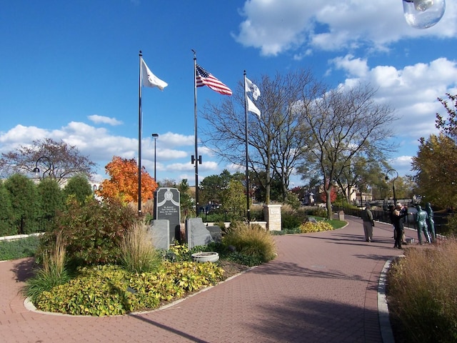 view of property's community featuring a gate