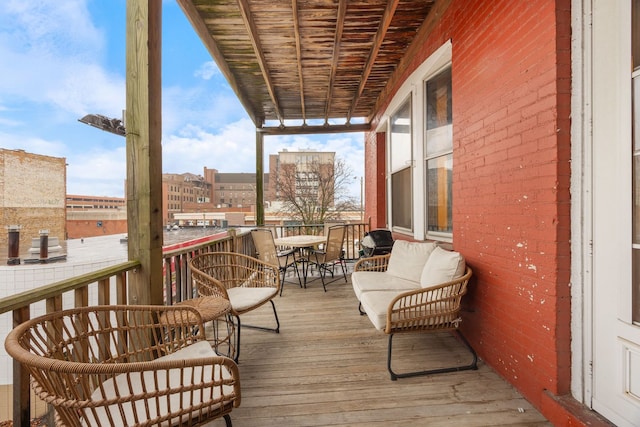 balcony featuring a sunroom