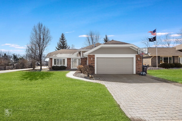 ranch-style house featuring a garage, a front yard, decorative driveway, and brick siding