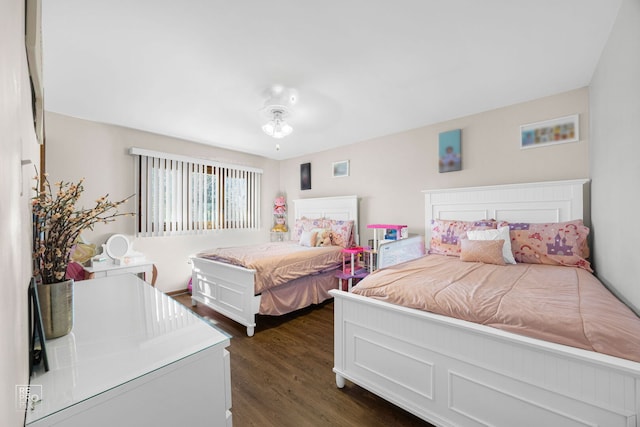 bedroom featuring dark wood-type flooring