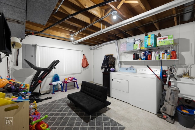 interior space featuring independent washer and dryer and electric panel