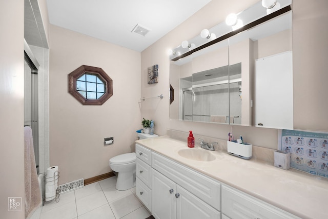 full bathroom featuring toilet, a stall shower, vanity, and visible vents