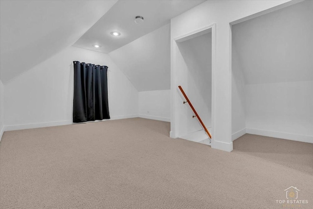 bonus room with lofted ceiling, carpet floors, recessed lighting, and baseboards