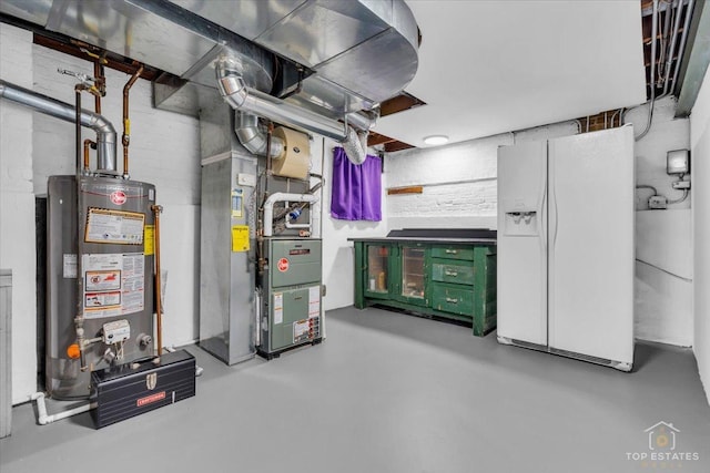 utility room with water heater