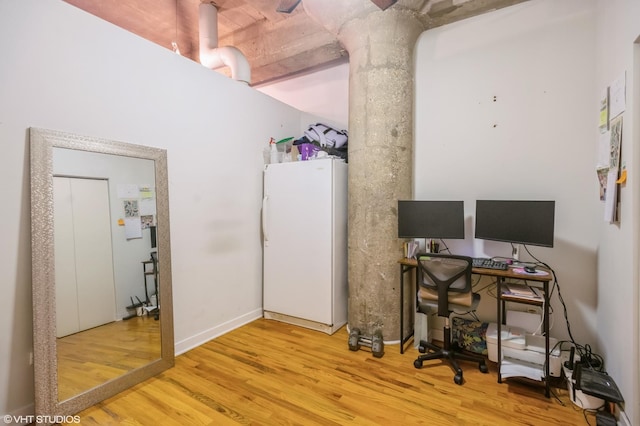 office area with wood finished floors