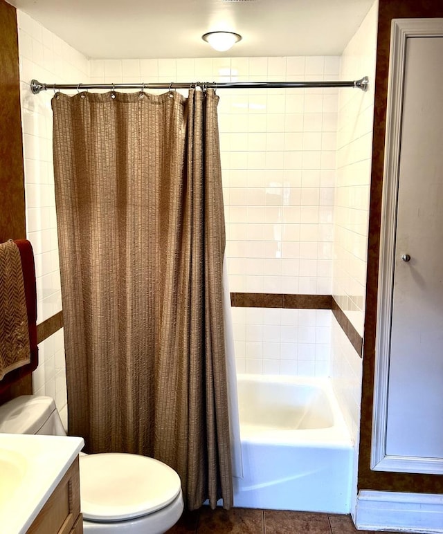 bathroom with toilet, tile patterned flooring, shower / bath combination with curtain, and vanity