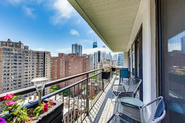 balcony featuring a city view