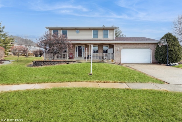 traditional-style home with a front yard, a garage, brick siding, and covered porch