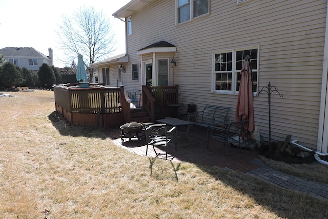 view of yard featuring a patio and a deck