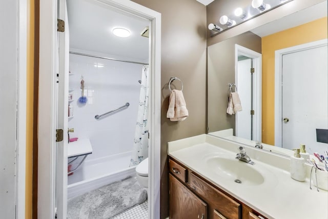 bathroom with toilet, a stall shower, tile patterned flooring, and vanity