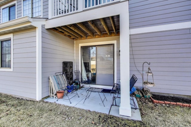 view of patio featuring a balcony