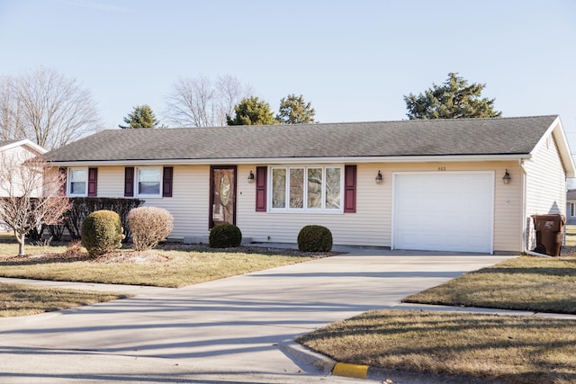 ranch-style house with driveway, an attached garage, and roof with shingles