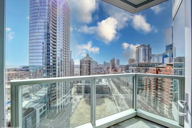 balcony featuring a city view