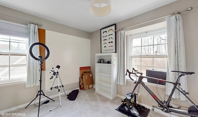 exercise area with carpet flooring and baseboards