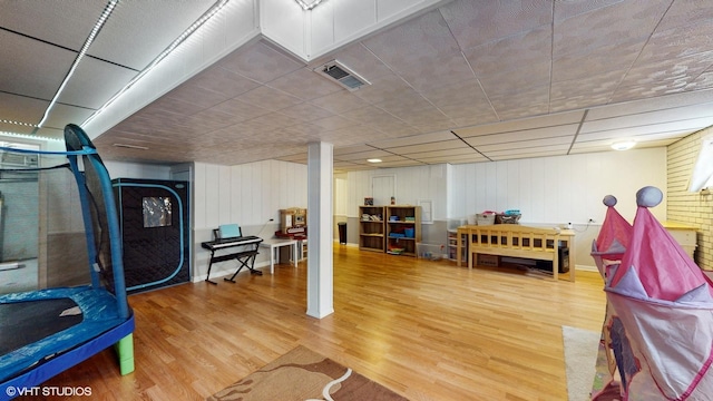 game room featuring visible vents and wood finished floors