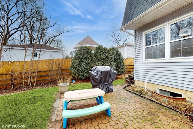 view of patio / terrace with fence and grilling area