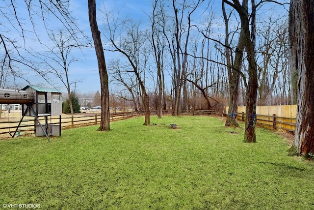 view of yard featuring fence