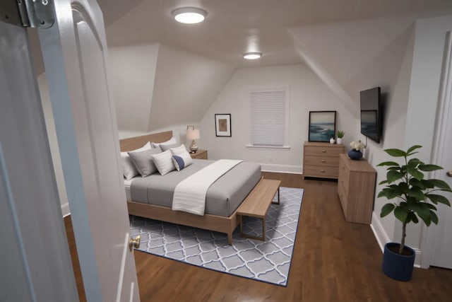 bedroom featuring vaulted ceiling, baseboards, and wood finished floors