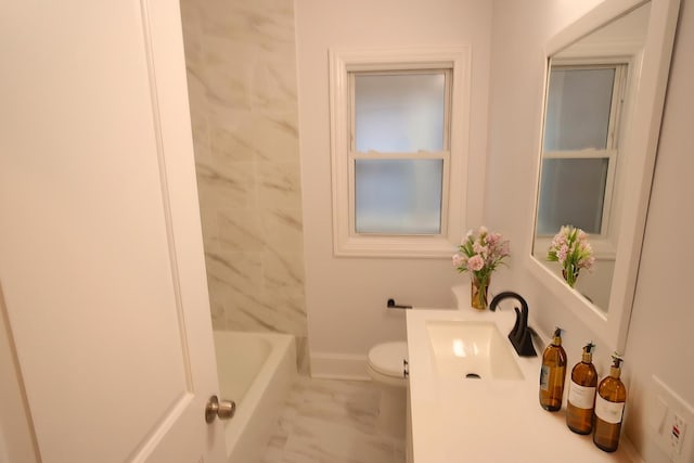 full bathroom featuring marble finish floor, baseboards, vanity, and toilet