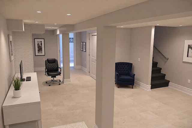 interior space featuring baseboards and recessed lighting