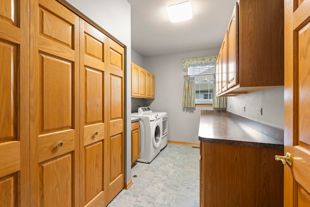 2811 Haven Ct, Naperville, IL 60564 - laundry room with baseboards, cabinet space, and separate washer and dryer