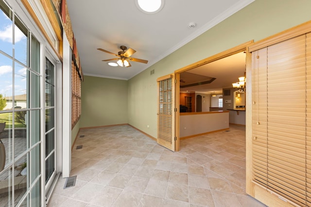 2811 Haven Ct, Naperville, IL 60564 - empty room featuring baseboards, visible vents, ceiling fan with notable chandelier, and ornamental molding